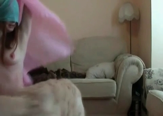 Blindfolded zoophile and her dog