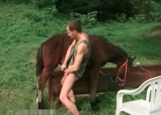 Zoophile rubs his hard dick