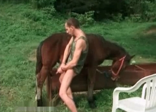 Zoophile rubs his hard dick
