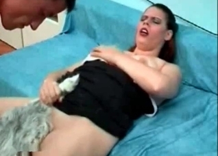 Dog fucker holds her horny pet