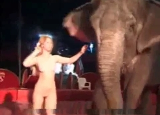 Redhead and her trained elephant